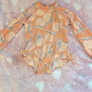 Jessica Simpson, Rashguard.